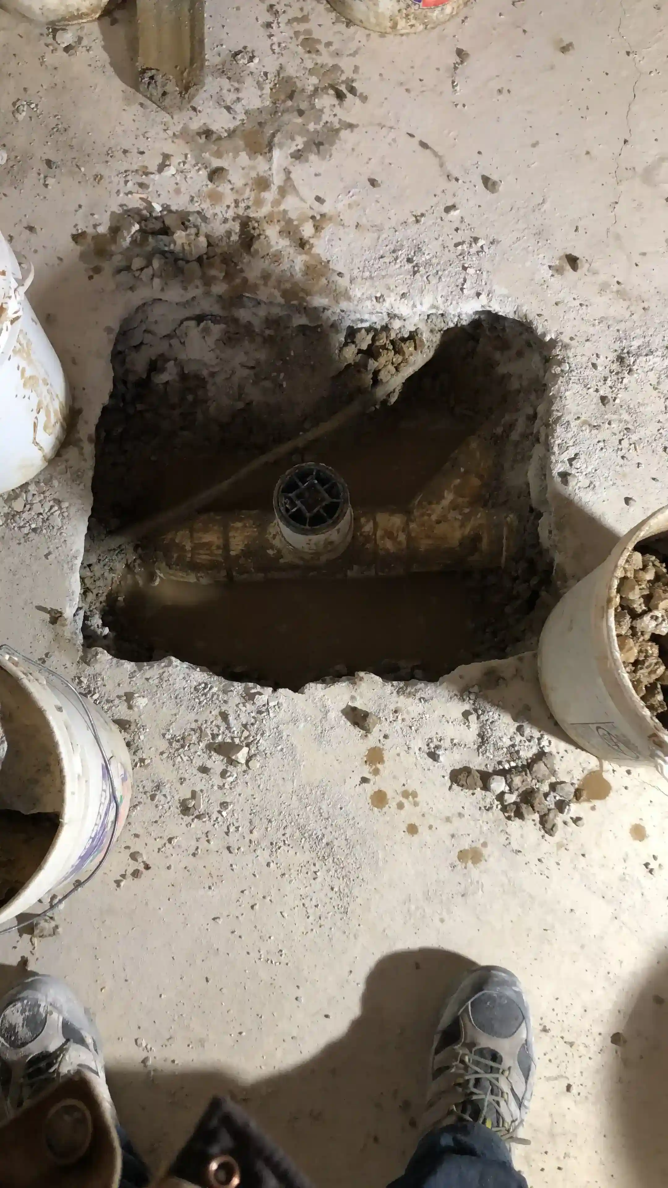 Floor excavation for drain installation