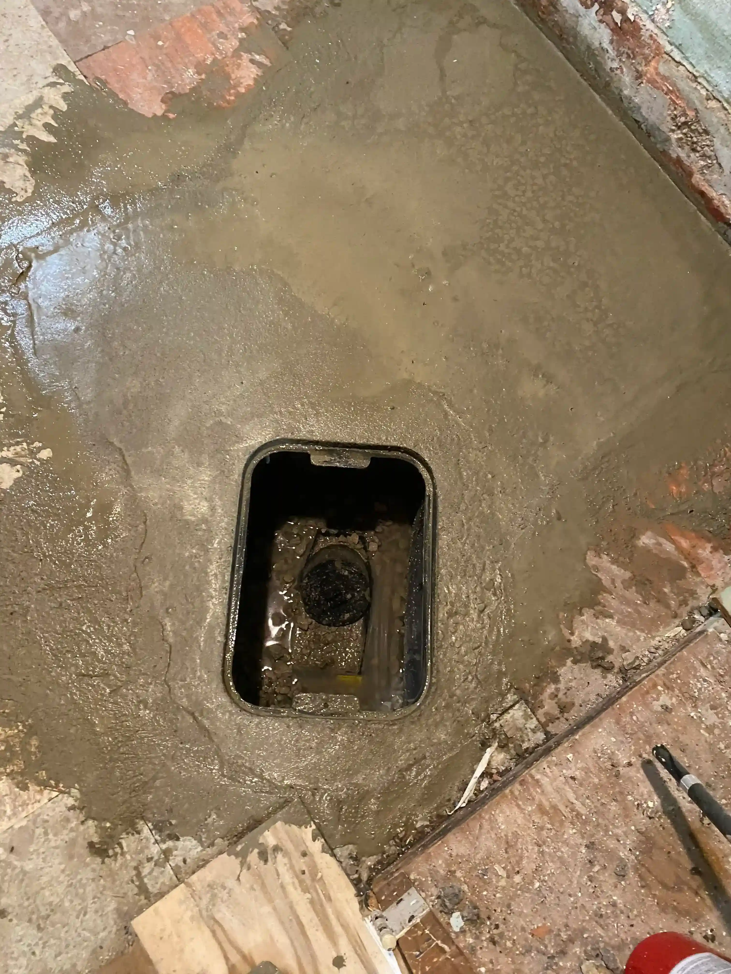 Backwater valve with fresh concrete