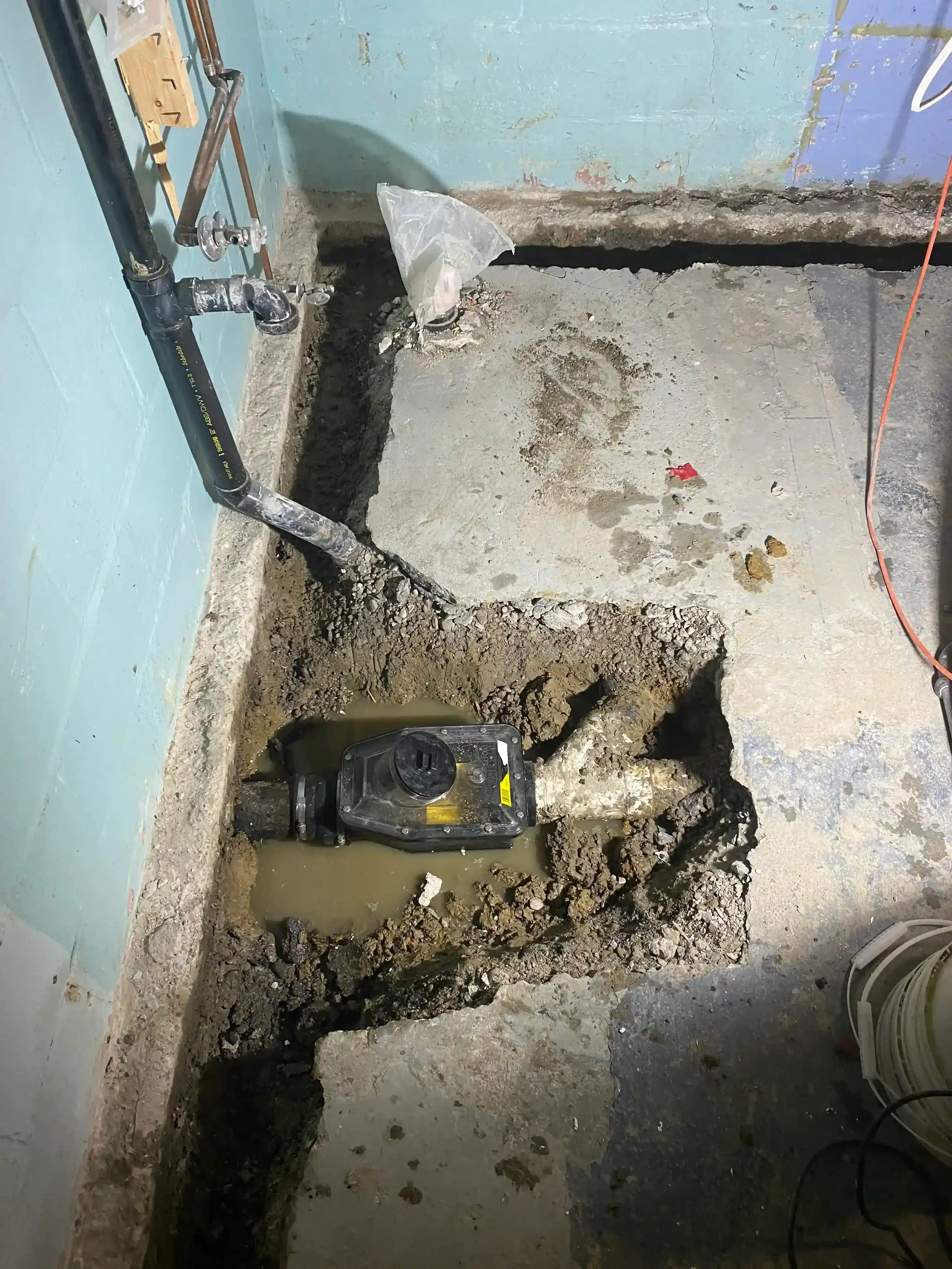 Sump pump with interior drainage