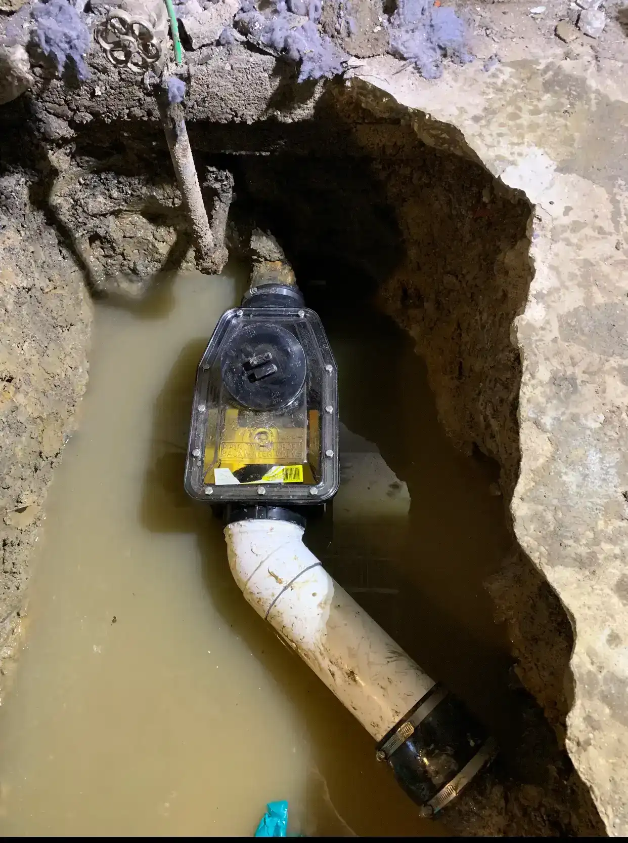 Interior drainage system installation